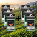 Mehrere Darjeeling-Tee-Packungen mit schwarzem Papierbeutel und Etikett